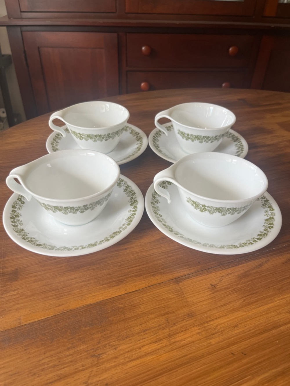 Vintage Corelle green spring blossom “crazy daisy” hook-handle w/ saucer mugs